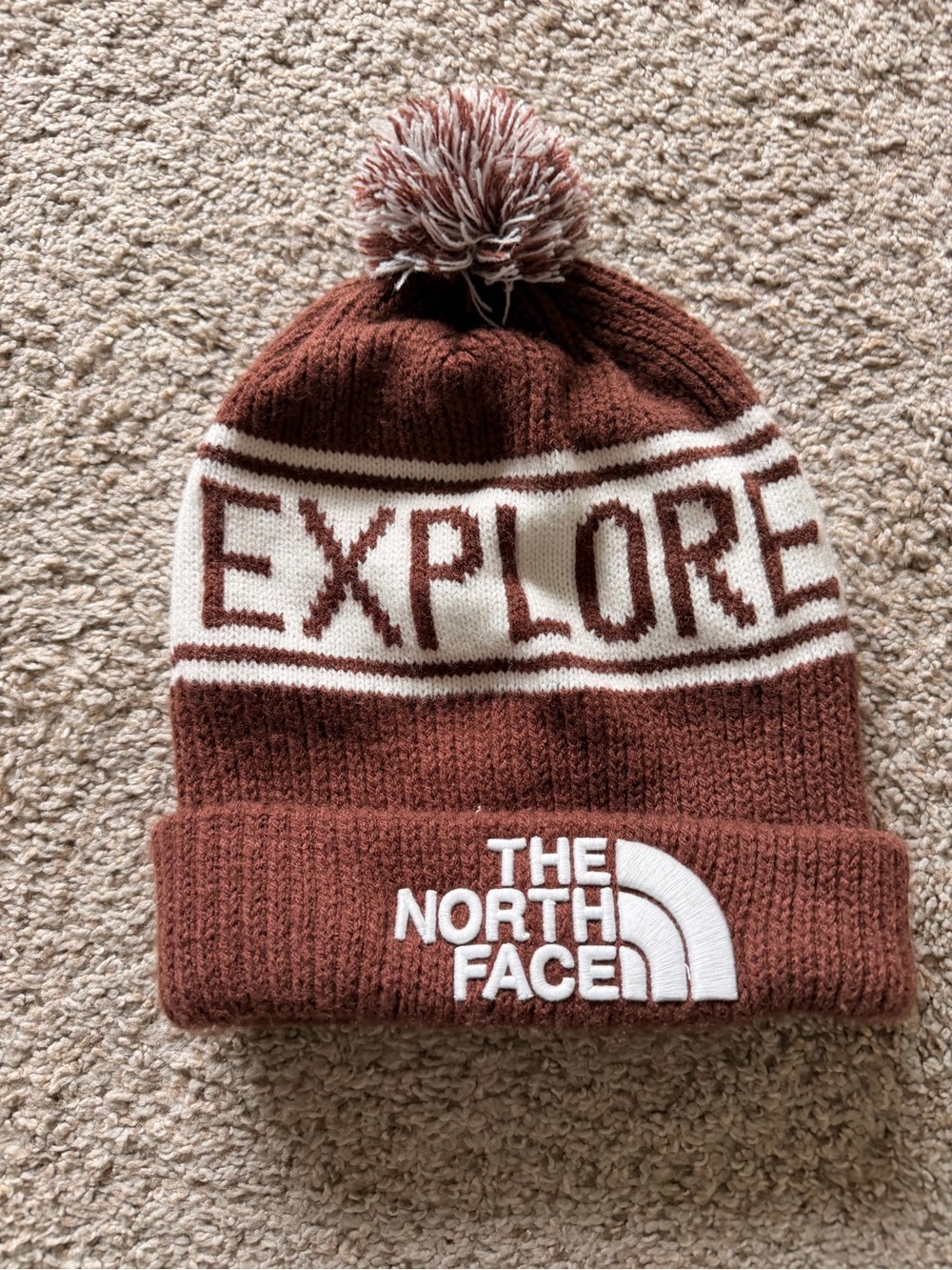 The North Face PomPom Beanie in Brown and Cream